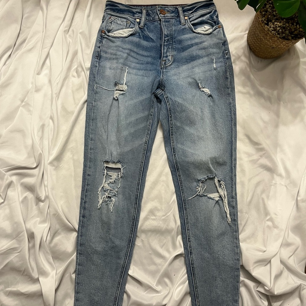 Women's Distressed Blue Jeans
